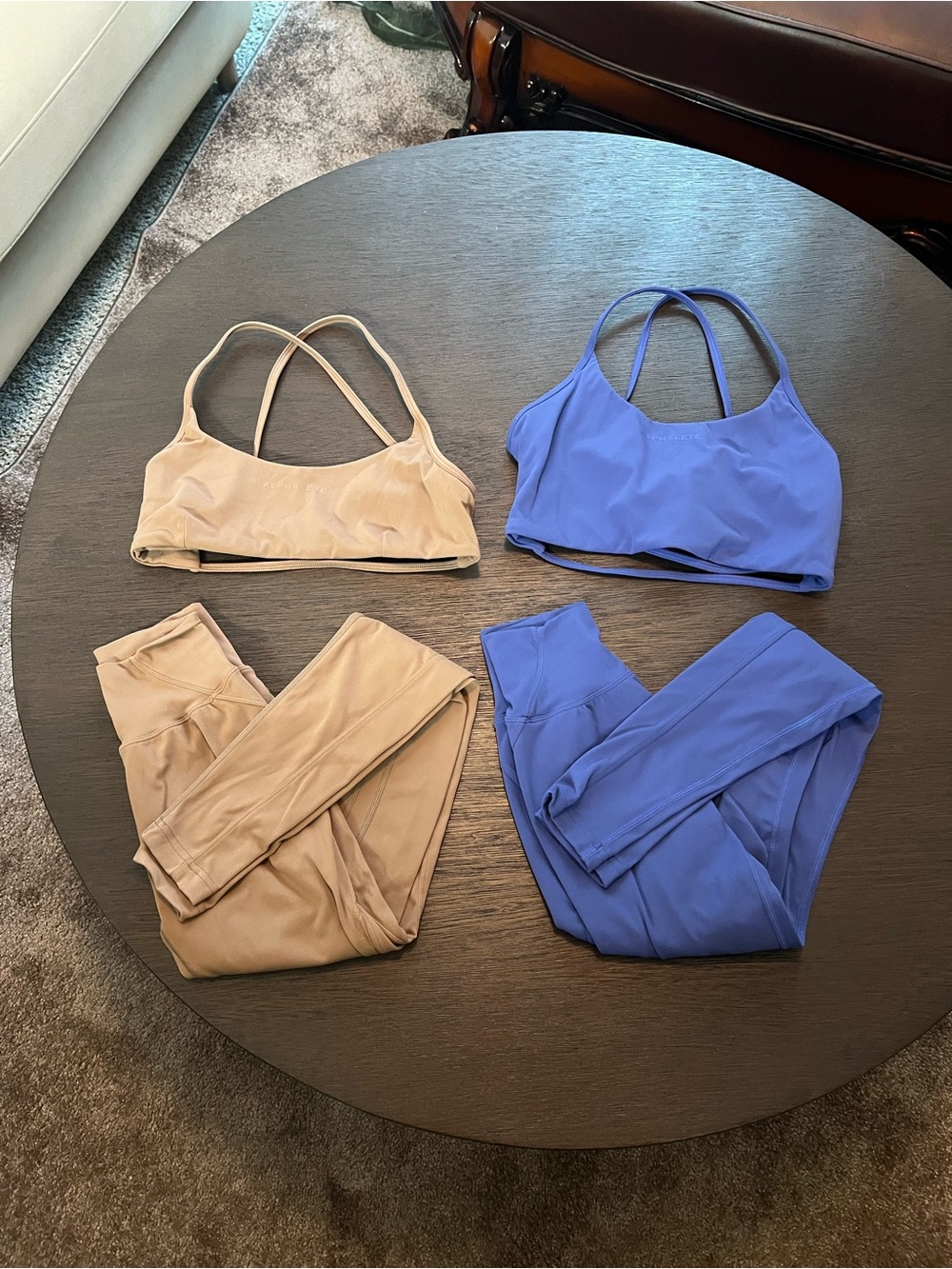 2 Alphalete Aura legging and bra sets
